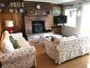 Gull's Call living room nautical theme wood stove